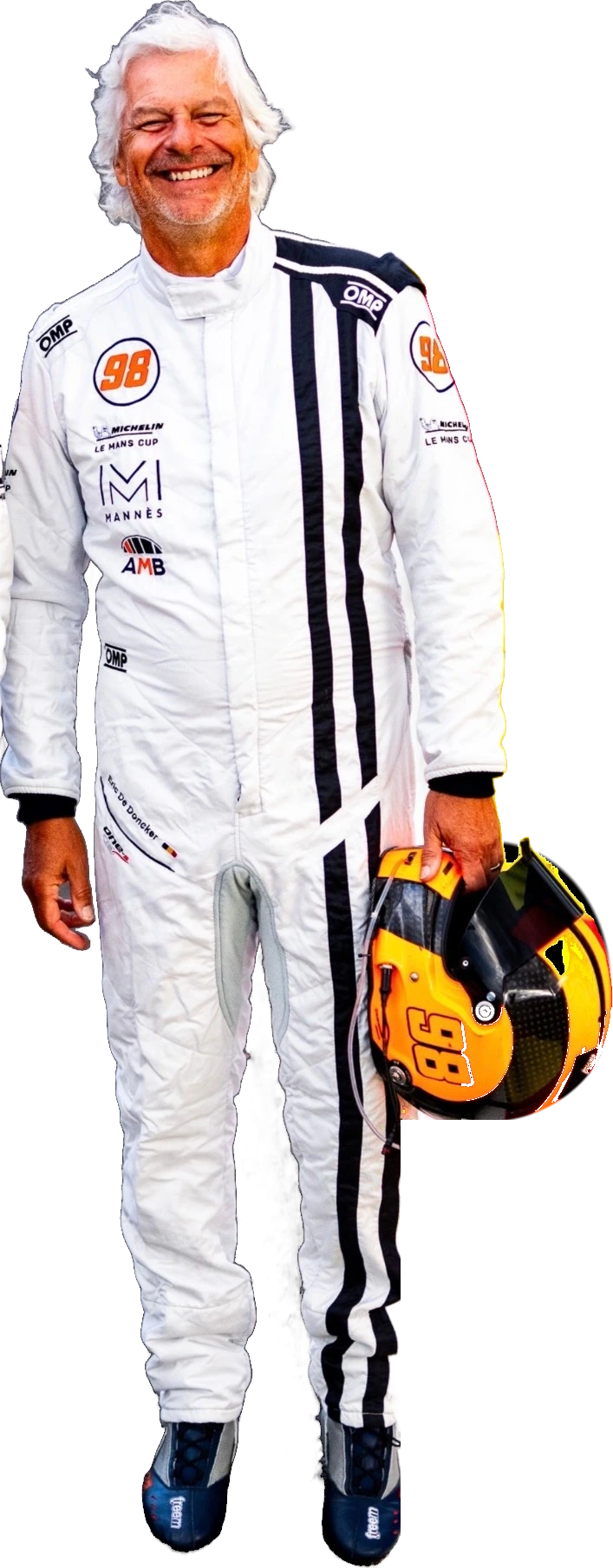 Eric De Doncker, tout sourire, en combinaison blanche Motorsport98, son casque jaune et noir à la main